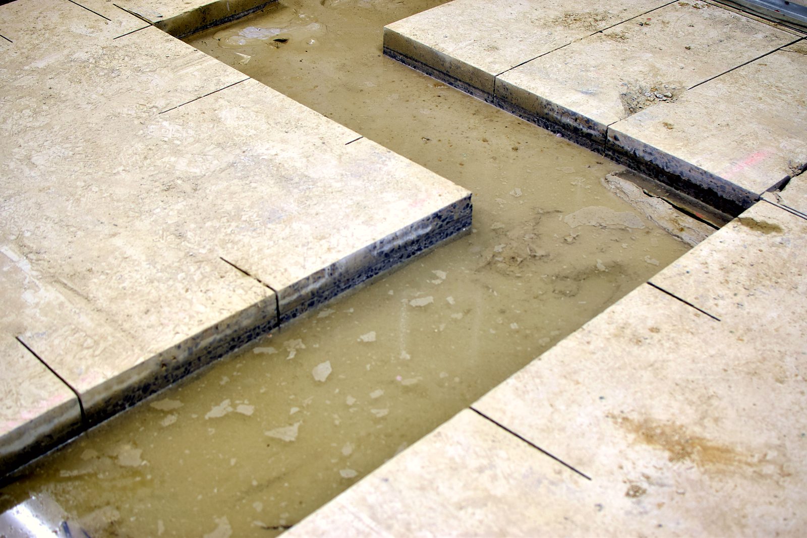 Slab saw-cut for new plumbing